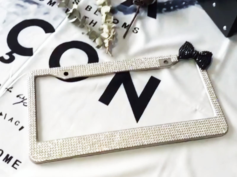 White Diamond + Black Bow rhinestone license plate frames